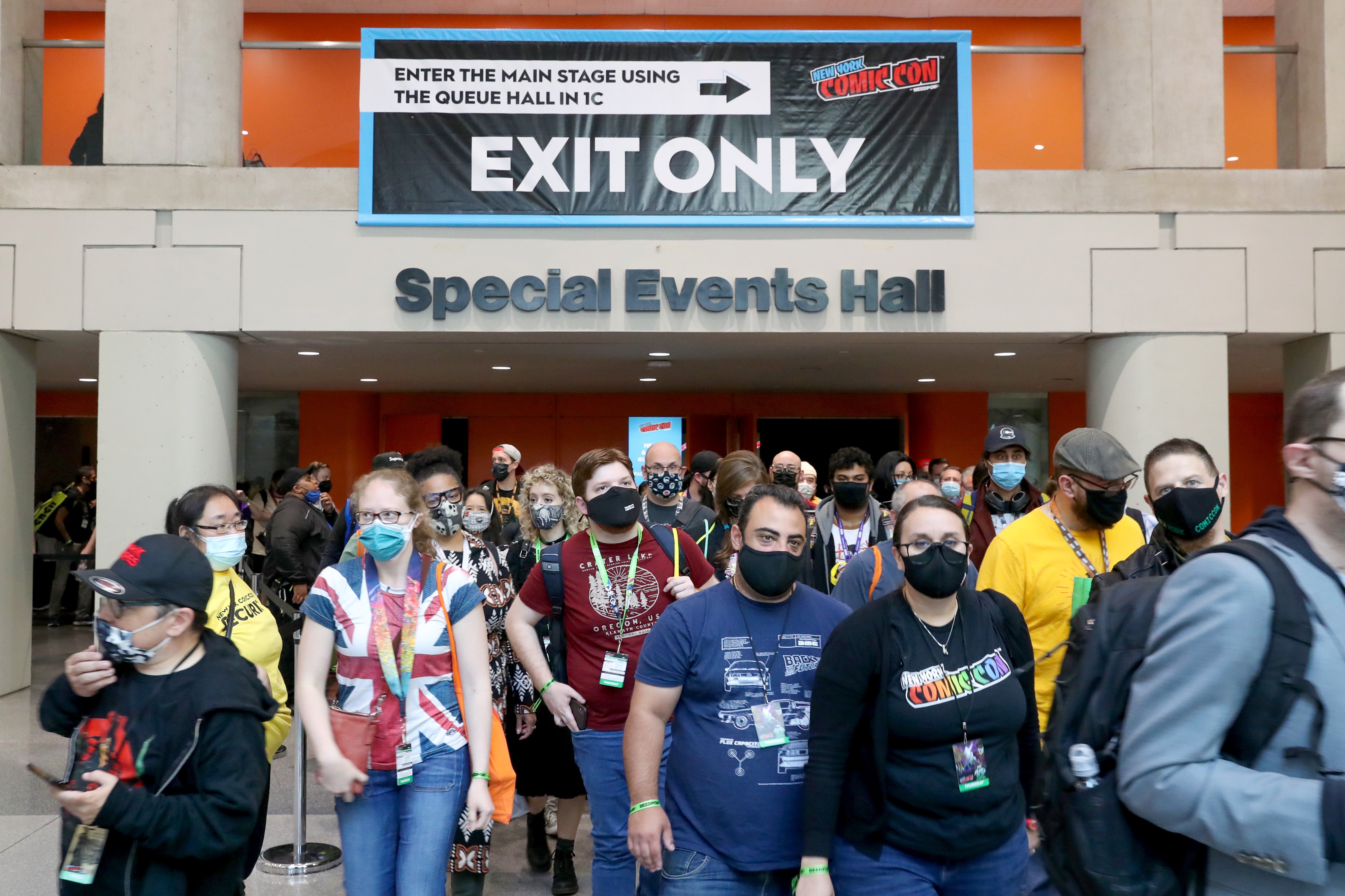 Interior of Javitz Center during New York Comic Con featuring masked convention goers