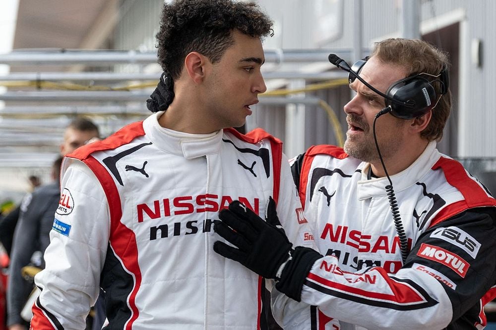 Still image from Gran Turismo movie featuring Jann and his trainer