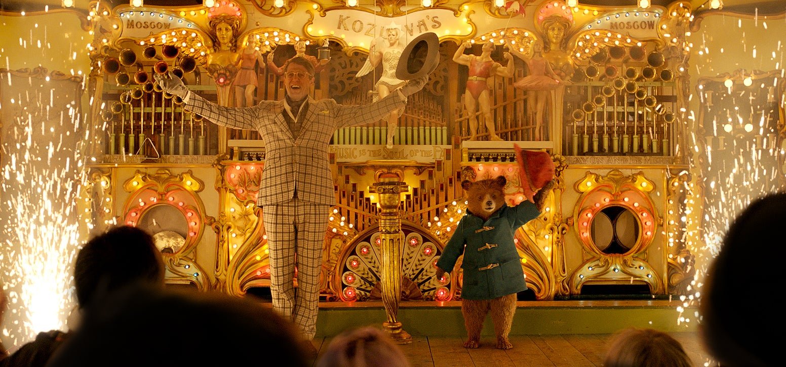 Movie still from Paddington 2 featuring Paddington Bear