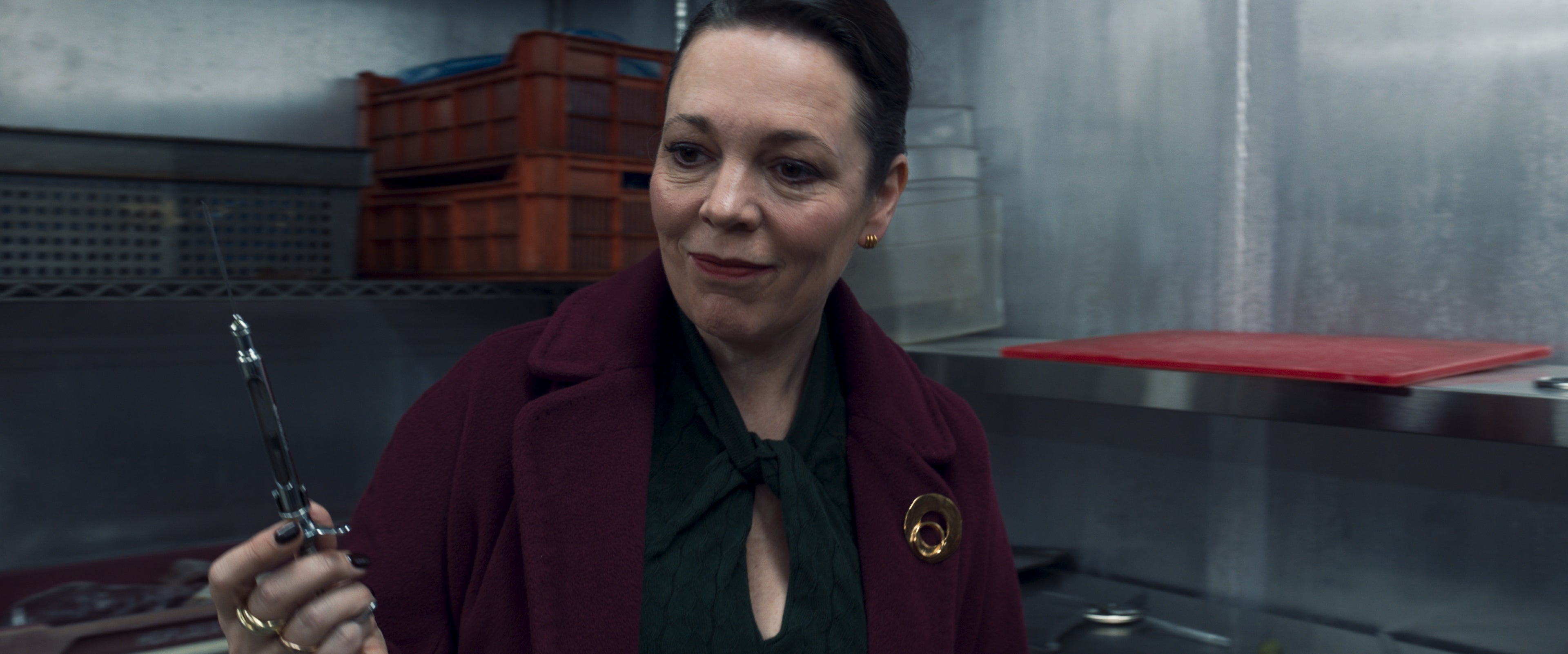 Still image of Olivia Colman in Secret Invasion holding up a vial