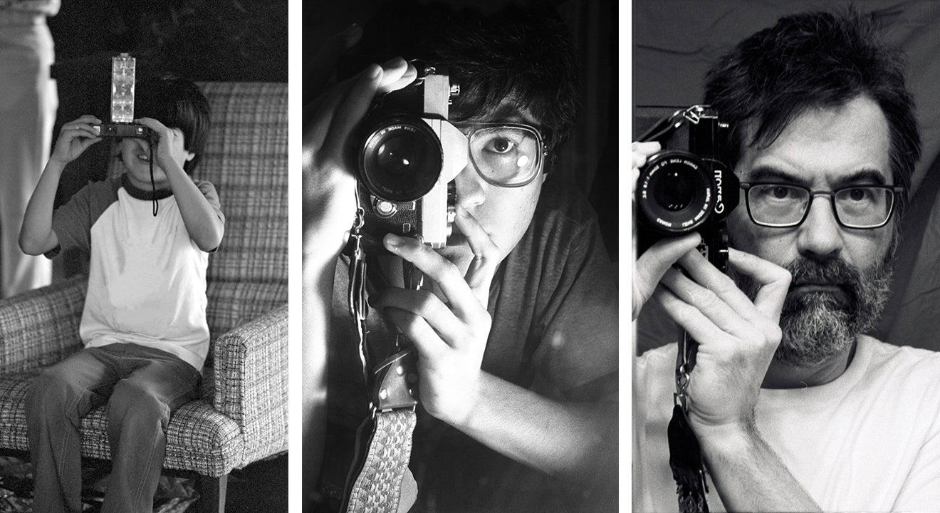 Three images of Greg Pak taking a photo of himself (black and white)